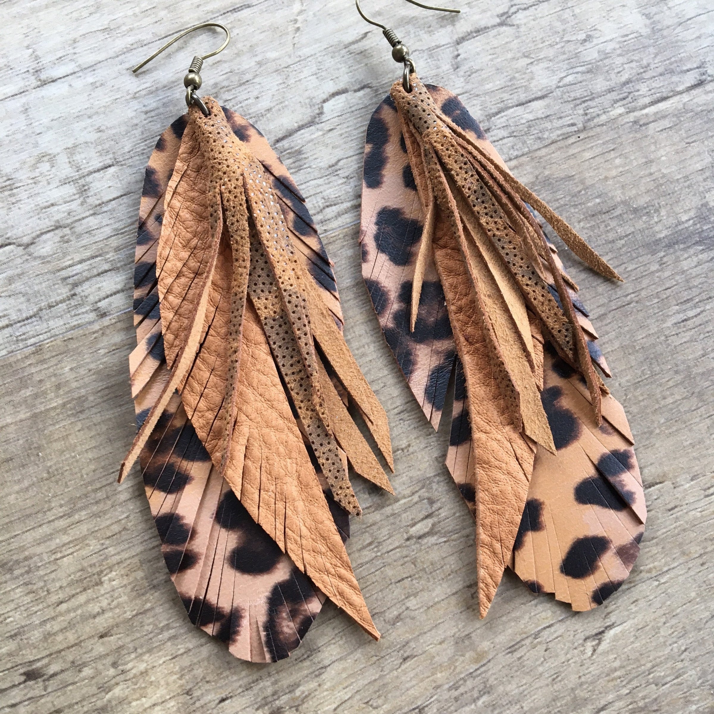 Leopard feather earrings shop